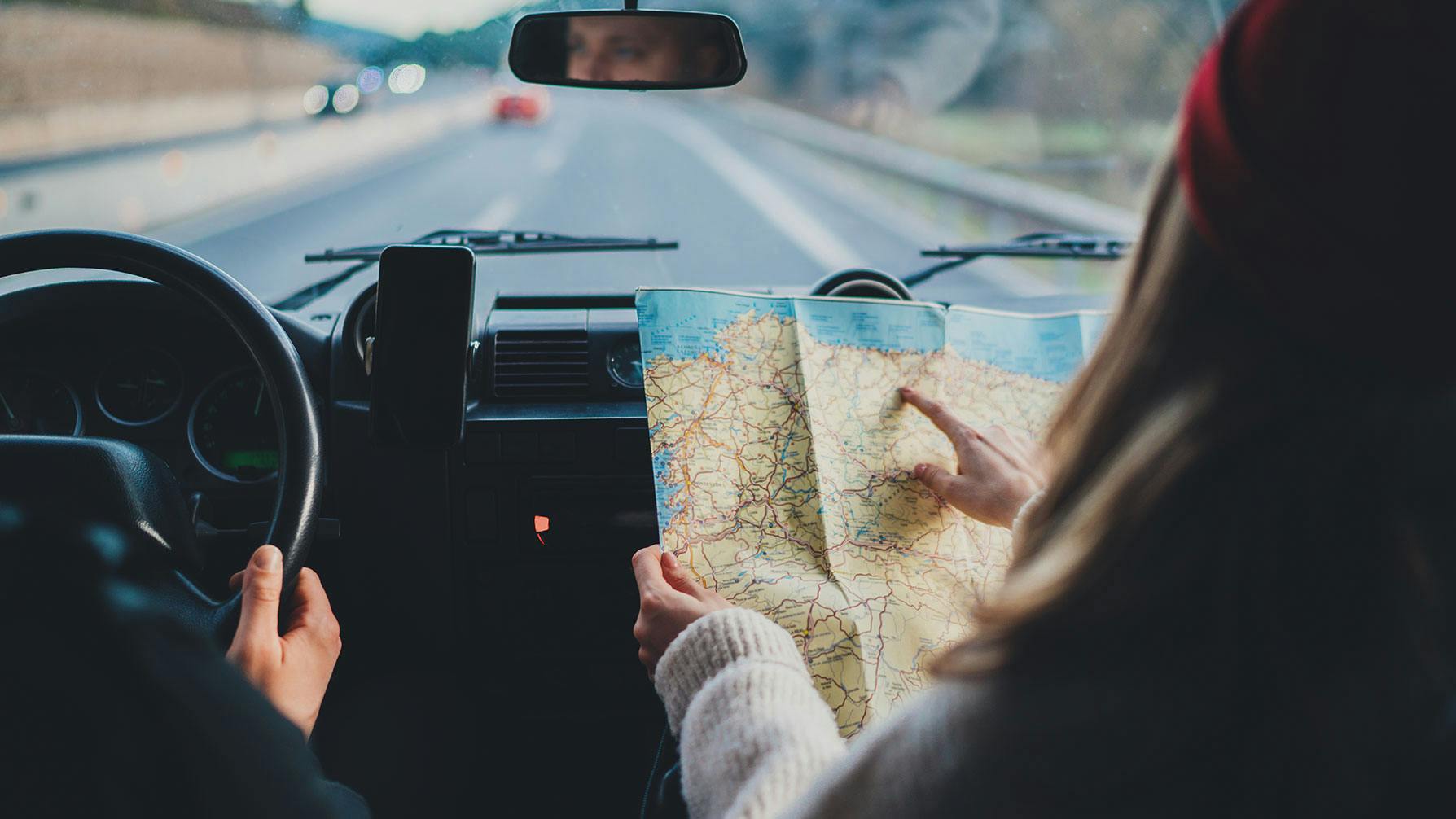Looking at a map on a road trip