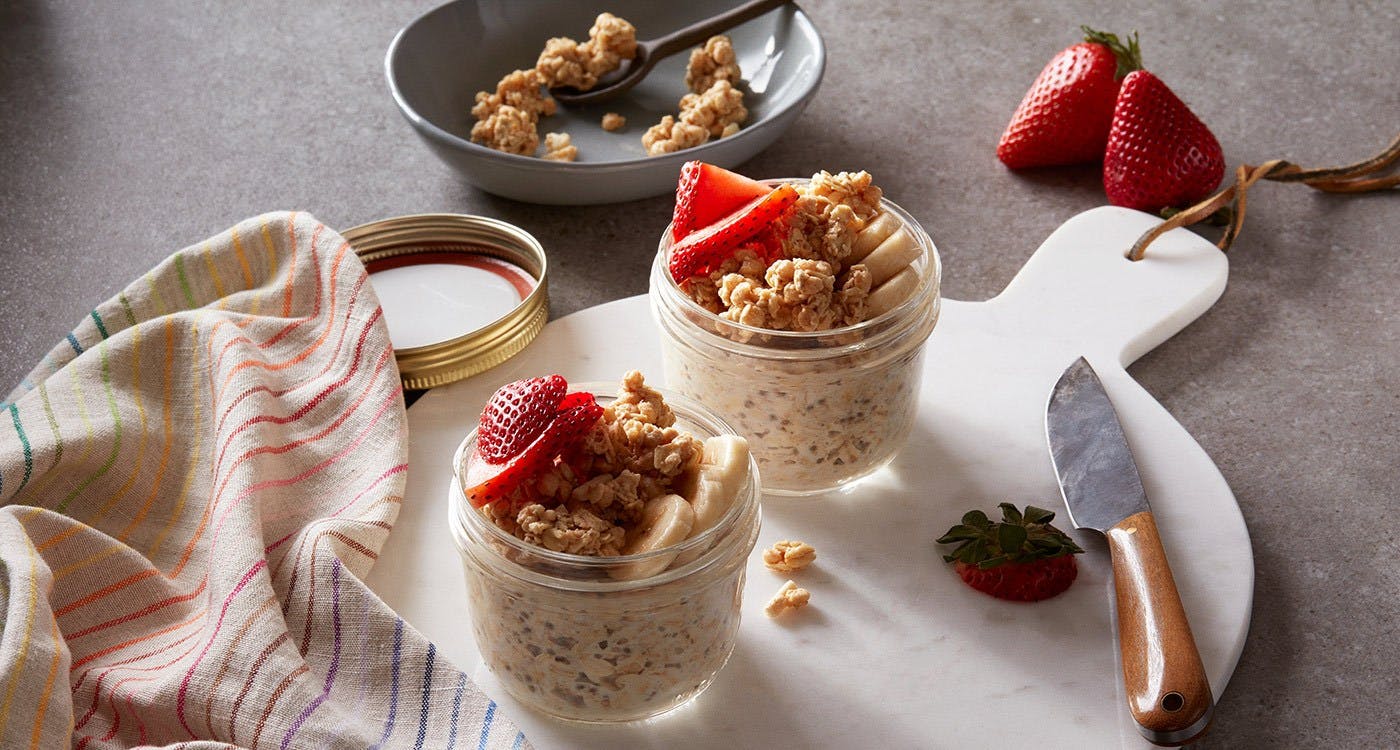 Overnight Oats with granola, strawberries, and bananas