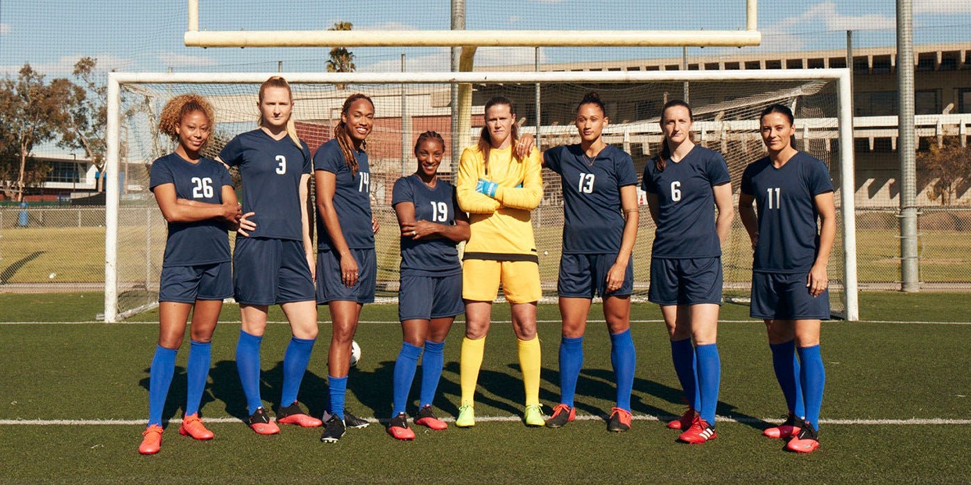 US Women's National Soccer Team standing at goal